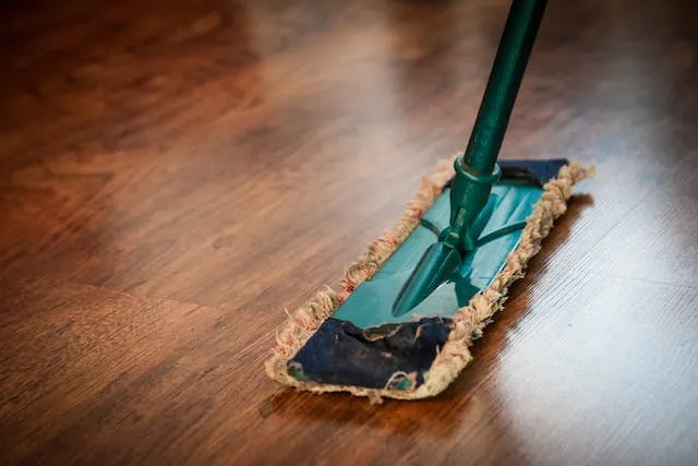 A close-up view of a clean, polished brown wooden floor.