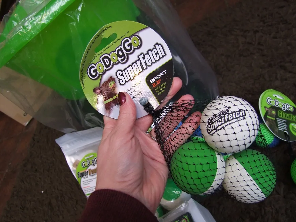 A collection of high-quality, robust tennis balls specifically designed for automatic dog ball launchers