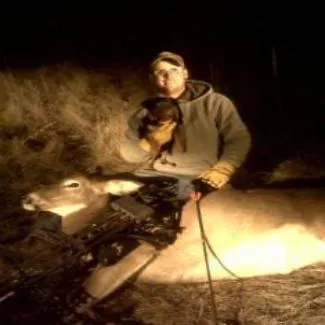 A determined wired coat Jack Russell Terrier actively engaged in a hunt, demonstrating working drive