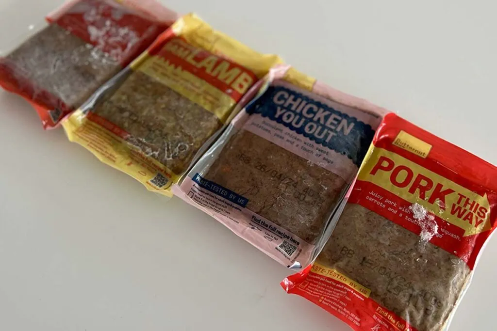 A dog enjoying its Butternut Box meal, illustrating the value of premium dog food