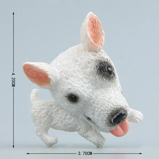 A fridge magnet which looks like a cute sitting Bull Terrier with a super big face.