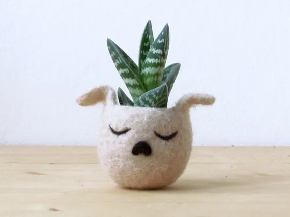 A miniature puppy planter