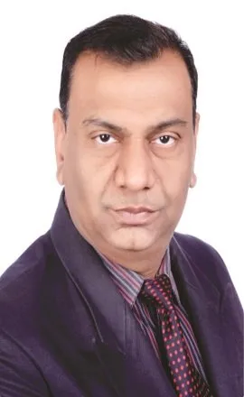 A playful Miniature Australian Shepherd puppy with striking blue eyes