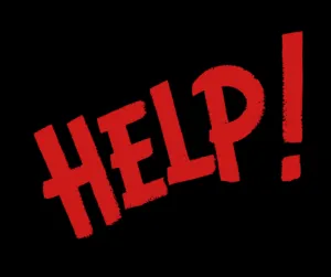 A sad-looking puppy in a crate, showing signs of distress and fear, indicating the psychological reasons a puppy breaks out of crate.