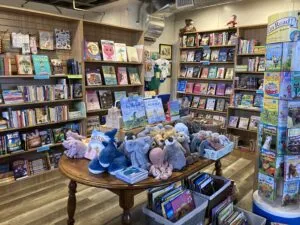 A selection of colorful children's books arranged on a shelf.