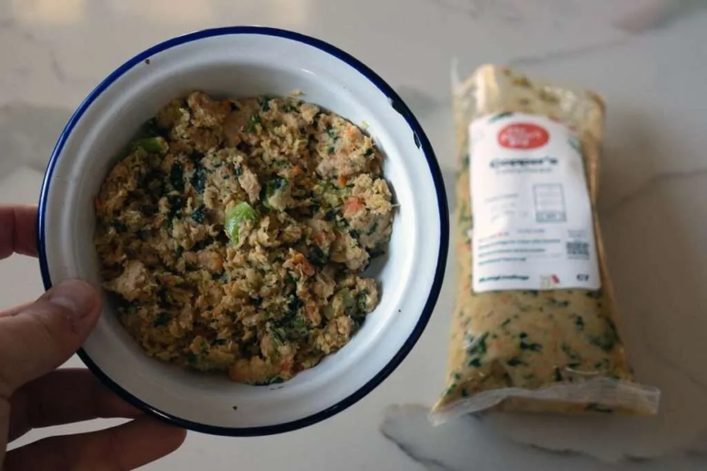 A selection of The Farmer's Dog meal pouches, showcasing the four recipe options