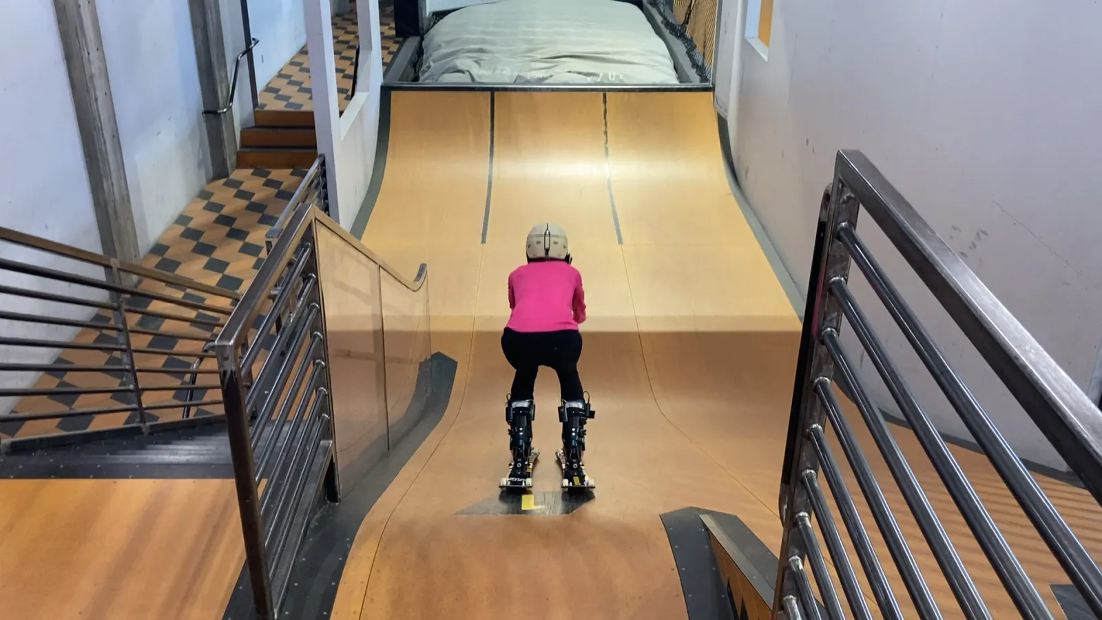 A senior dog mid-action, demonstrating a newly learned command with enthusiasm and slight imperfection.