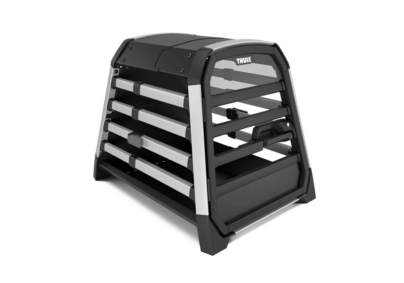 A silver Thule Allax dog cage in a car boot.