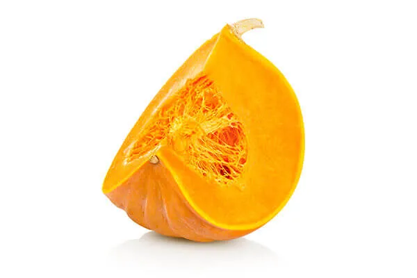 A sliced pumpkin, symbolizing natural vitamins and dietary fiber for canine health.