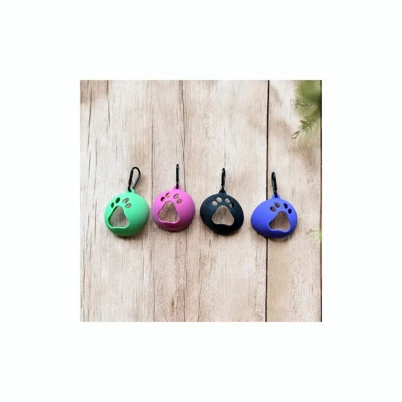 A variety of colourful silicone treat pouches and ball carriers, illustrating the range of accessories available to complement a dog walking utility belt.