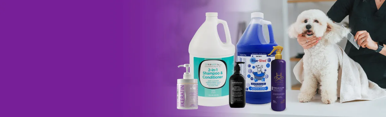 A variety of professional dog grooming products, including shampoos, conditioners, and brushes, neatly arranged on shelves.