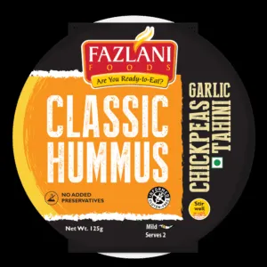 An Australian Silky Terrier puppy sleeping soundly in a cozy bed