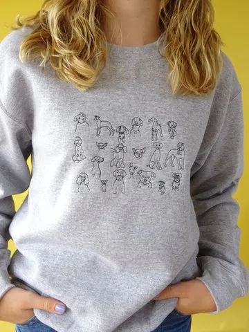 An embroidered sweater celebrating a love for dogs.