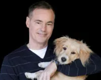 Author W. Bruce Cameron smiling, a New York Times bestselling author