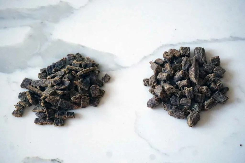 Badlands Ranch dog food and Sundays Food for Dogs bags side-by-side, summarizing the comparative review