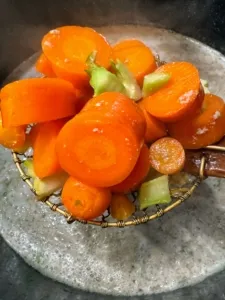 Bright orange carrots, a nutritious and low-calorie treat for dogs.