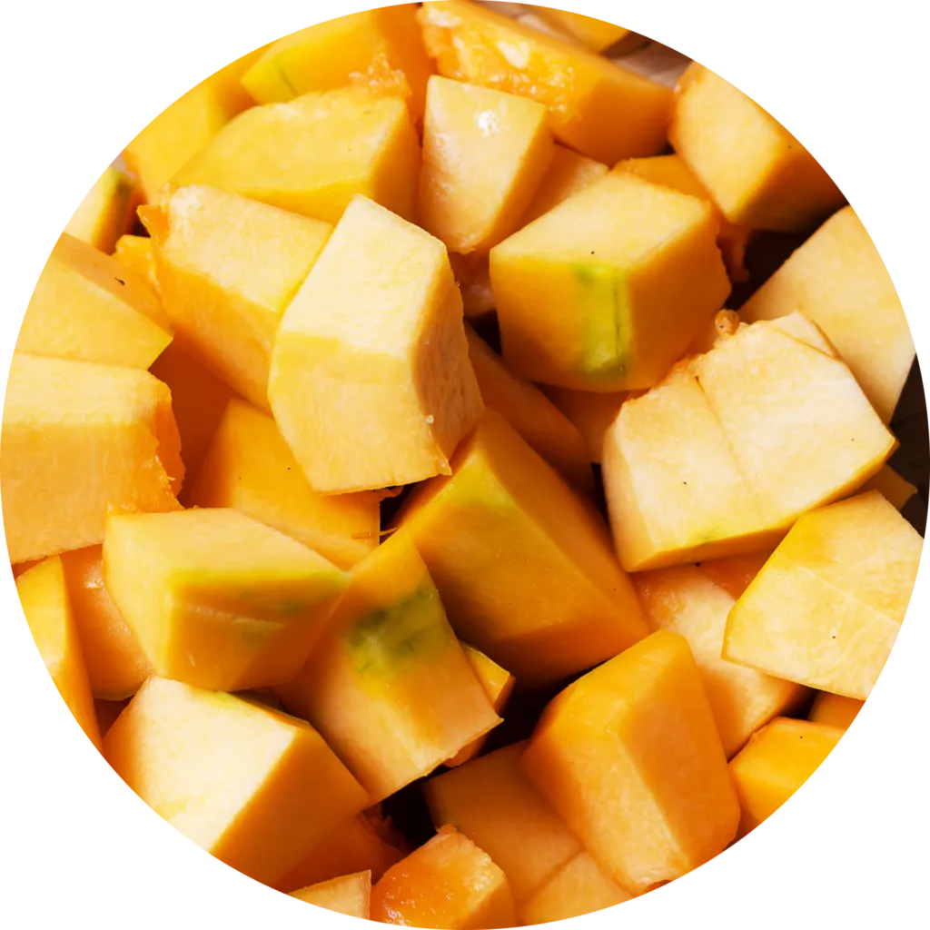 Bright orange pumpkin cut in half, a natural source of dietary fiber for canine digestion