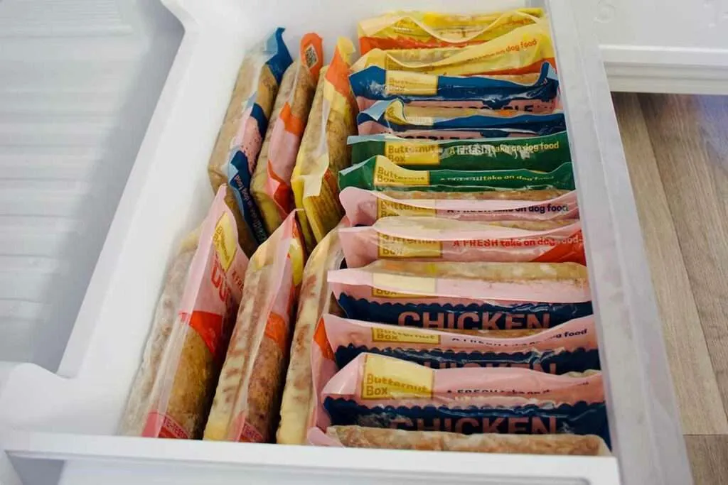 Butternut Box dog food pouches stored efficiently in a freezer drawer