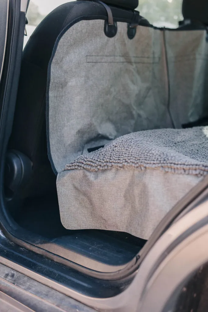 Close-up of the robust Oxford fabric, highlighting the waterproof and scratch-resistant qualities of the DGS Pet dog car seat cover.