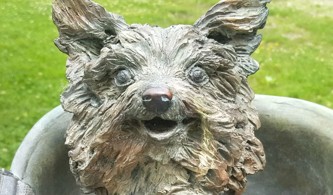 Close-up view of the bronze statue honoring Smoky the war dog, located near Cleveland, Ohio
