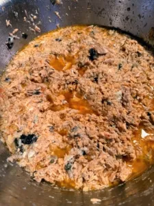 Cooked salmon, with a note to carefully check for bones.