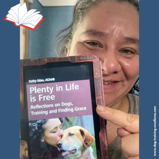 Cover of Kathy Sdao's 'Plenty in Life is Free', advancing positive puppy training methods