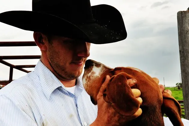 Cowboy Josh sharing a moment with Charlie the Ranch Dog.