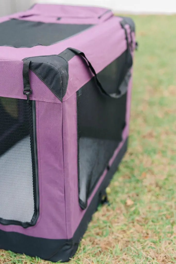 Detail of the mesh doors and Velcro straps on the EliteField soft dog crate.