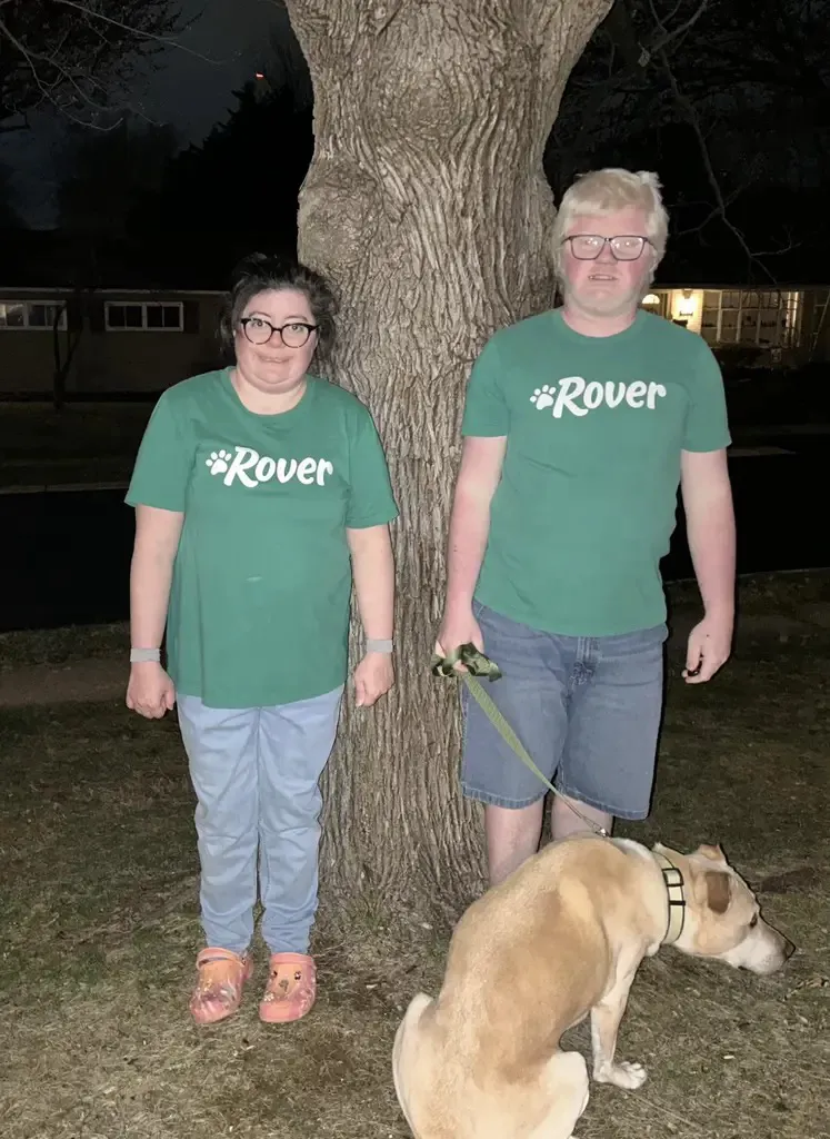 Dog enjoying a walk with a professional pet sitter from Christian & Becky's Pawfect Pet Care in Philadelphia