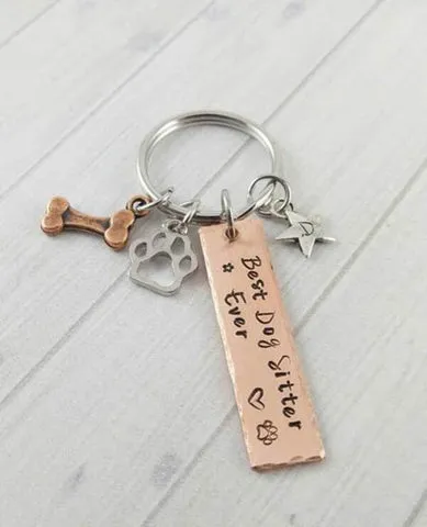 Dog keychain with paw and bone charms