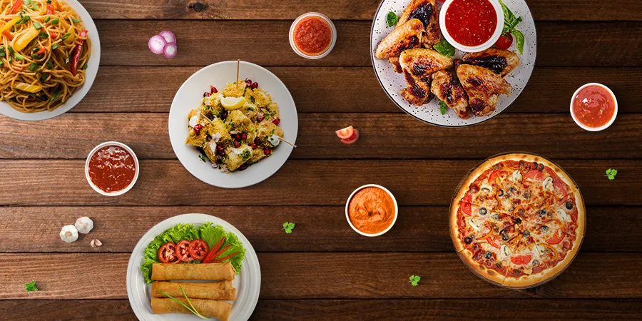 Dog tied to a stake tie out in a grassy yard