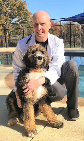 Dr. Aaron Luckey and dog