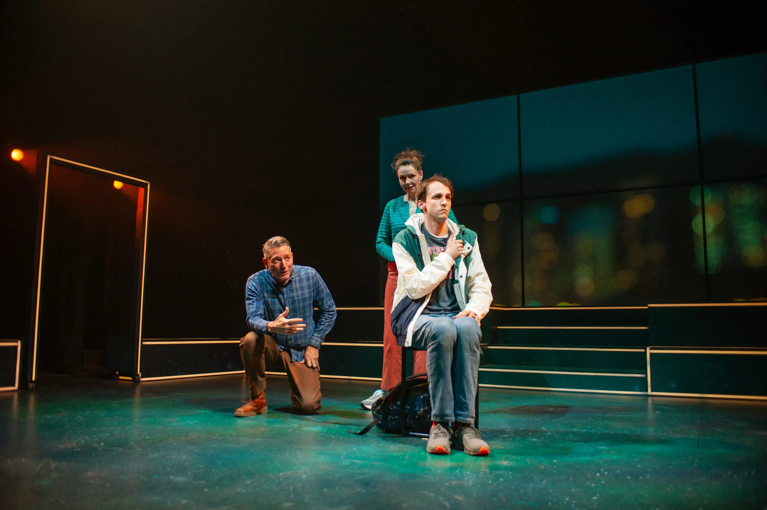 Ed (Mark P. Robinson) and Judy (Liz Sklar) attempt to connect with their son Christopher (Brendan Looney)