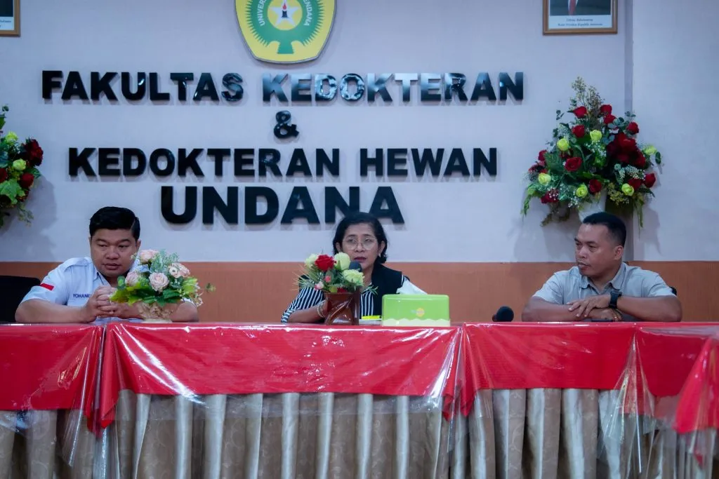 Four Radhiyan Pet Care scholarship recipients with Undana faculty members and company representatives.