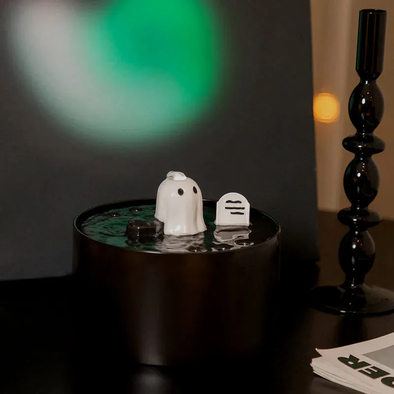 Ghost cat drinking fountain providing fresh water