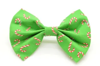 Green mini candy cane dog bow tie, representing festive wholesale dog accessories