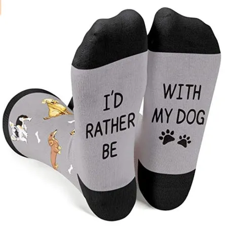 Grey socks with dog breeds and "I'd rather be with my dog" text, a humorous Christmas present from dog to dad