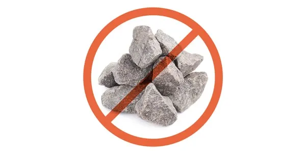 Hazardous rocks on a path, emphasizing why dogs should not chew on hard objects to prevent tooth damage