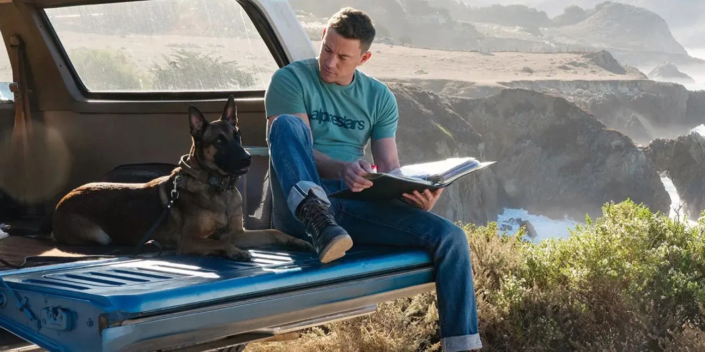 Jackson Briggs, portrayed by Channing Tatum, reading to Lulu in the back of his car, symbolizing the deep connection between a dog and its owner in the film Dog.