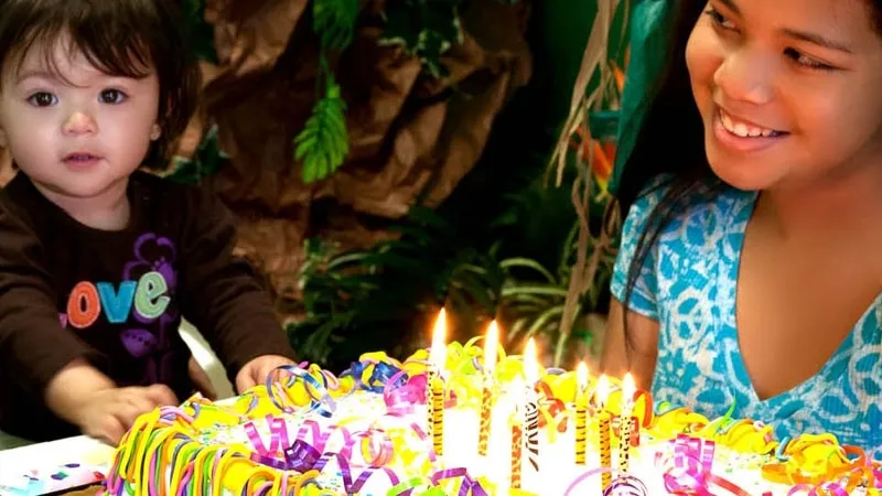 Kids celebrating a birthday party at an animal park