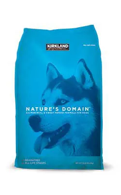 Kirkland Signature Nature's Domain dry dog food bag, emphasizing the salmon formula