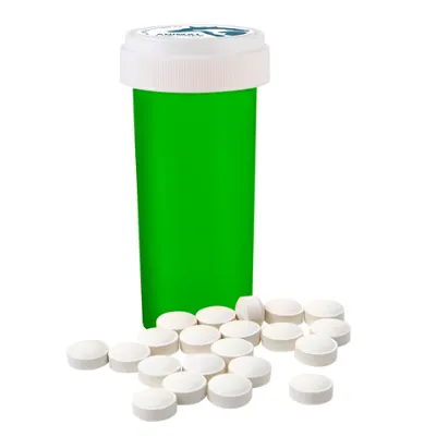 Metronidazole pills in a small dish, representing medication for canine use