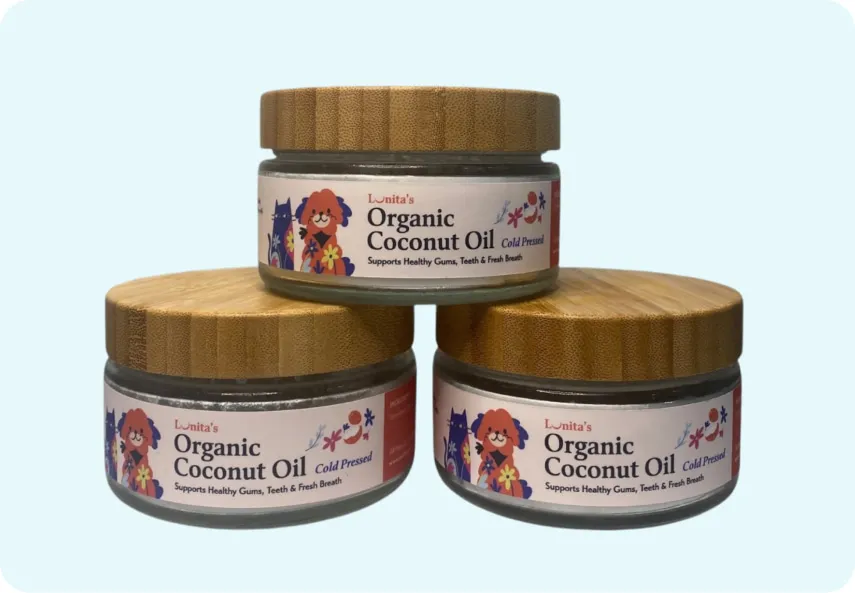 Organic coconut oil, a natural remedy for dog bad breath, used in pet dental care