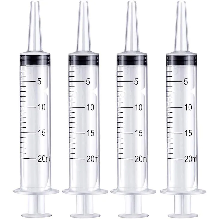 Pack of four large plastic syringes for feeding pets or flushing wounds