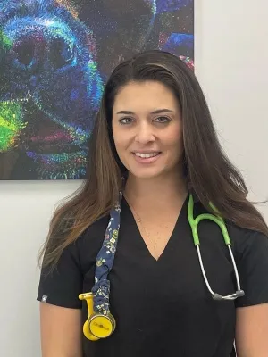 Professional headshot of Dr. Emily Reinier, a female veterinarian