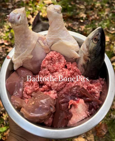 Raw Ground Chuck, Chicken Drumsticks, Mackerel Head, Beef Kidney, Chicken Liver, a complete raw food recipe for Pitbulls