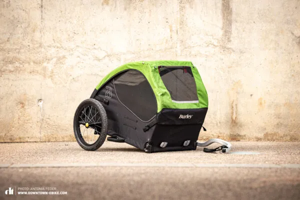The Burley Tail Wagon dog bike trailer is shown from a side perspective.