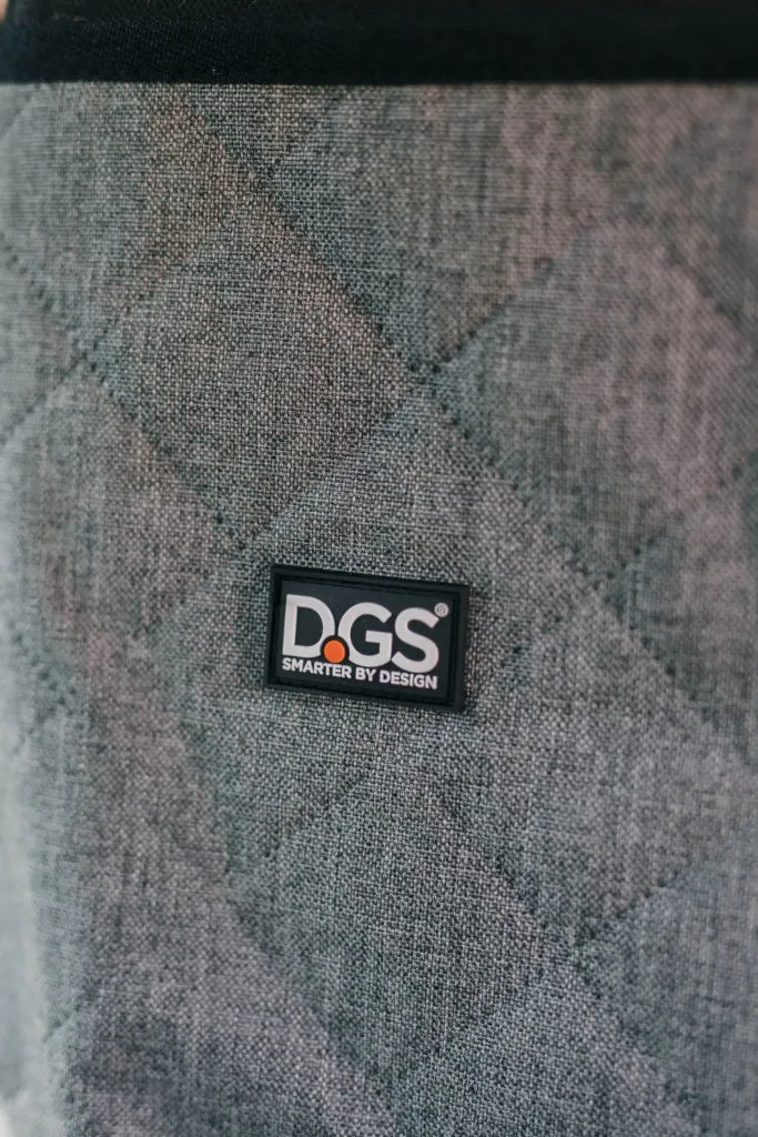 The durable Oxford waterproof fabric of the DGS Pet car seat cover, designed to resist dog nails and spills.