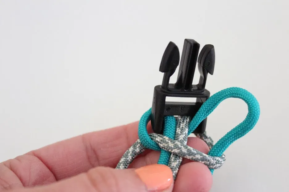 The left cord is pulled through the loop to tighten the weave.