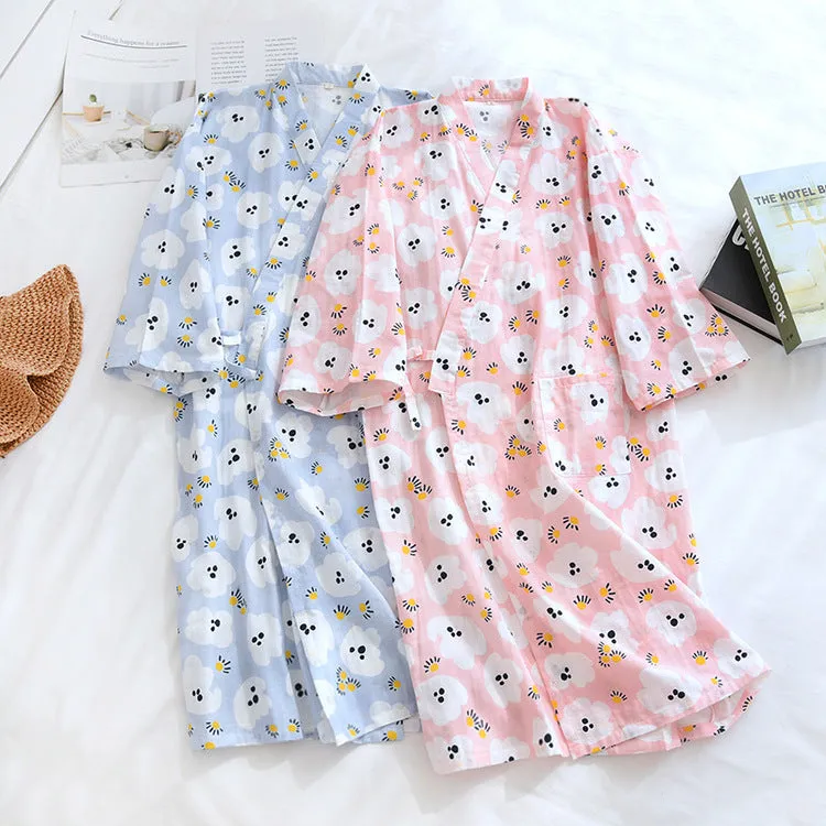 Two cotton ball Bichon Frise kimono robes in pink and blue
